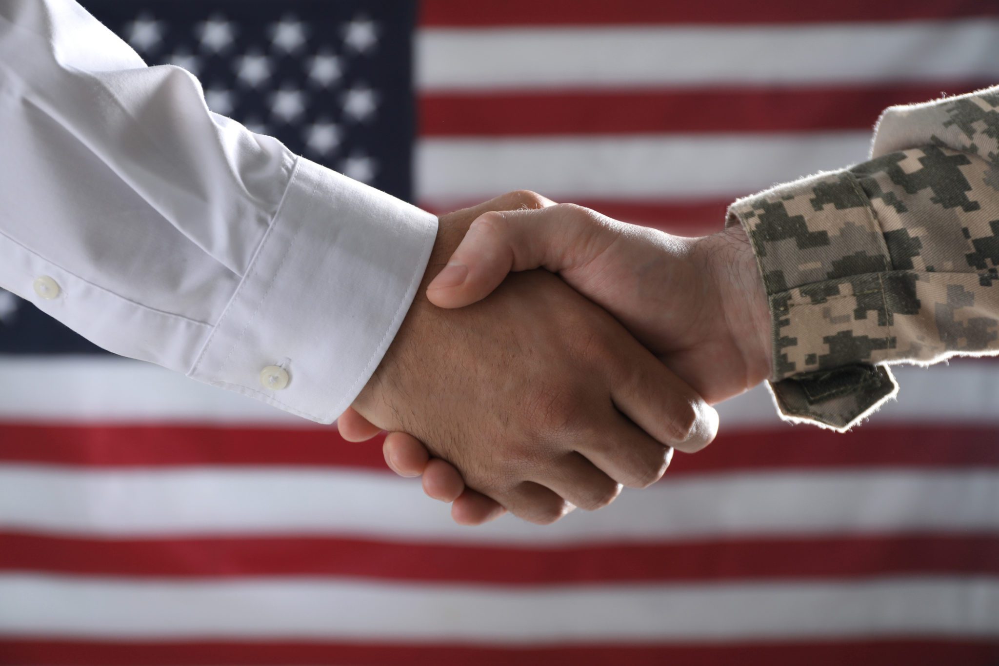 Soldier Shaking Hand with Businessman