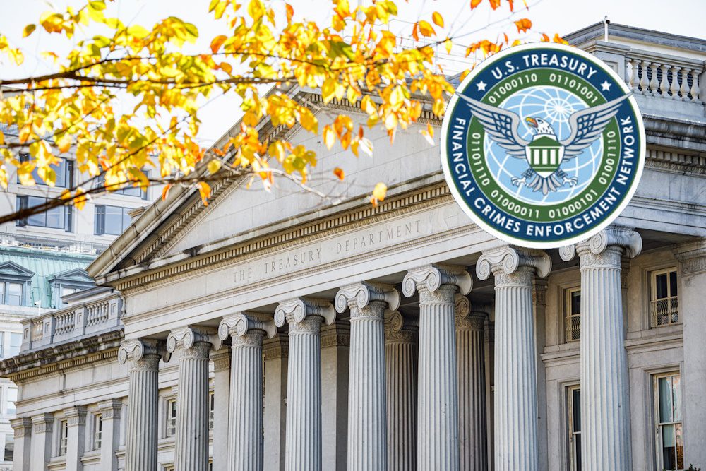 Exterior of the United States Department of Treasury building in downtown Washington, DC with FinCEN insignia