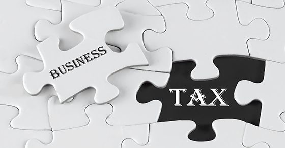 business tax puzzle pieces